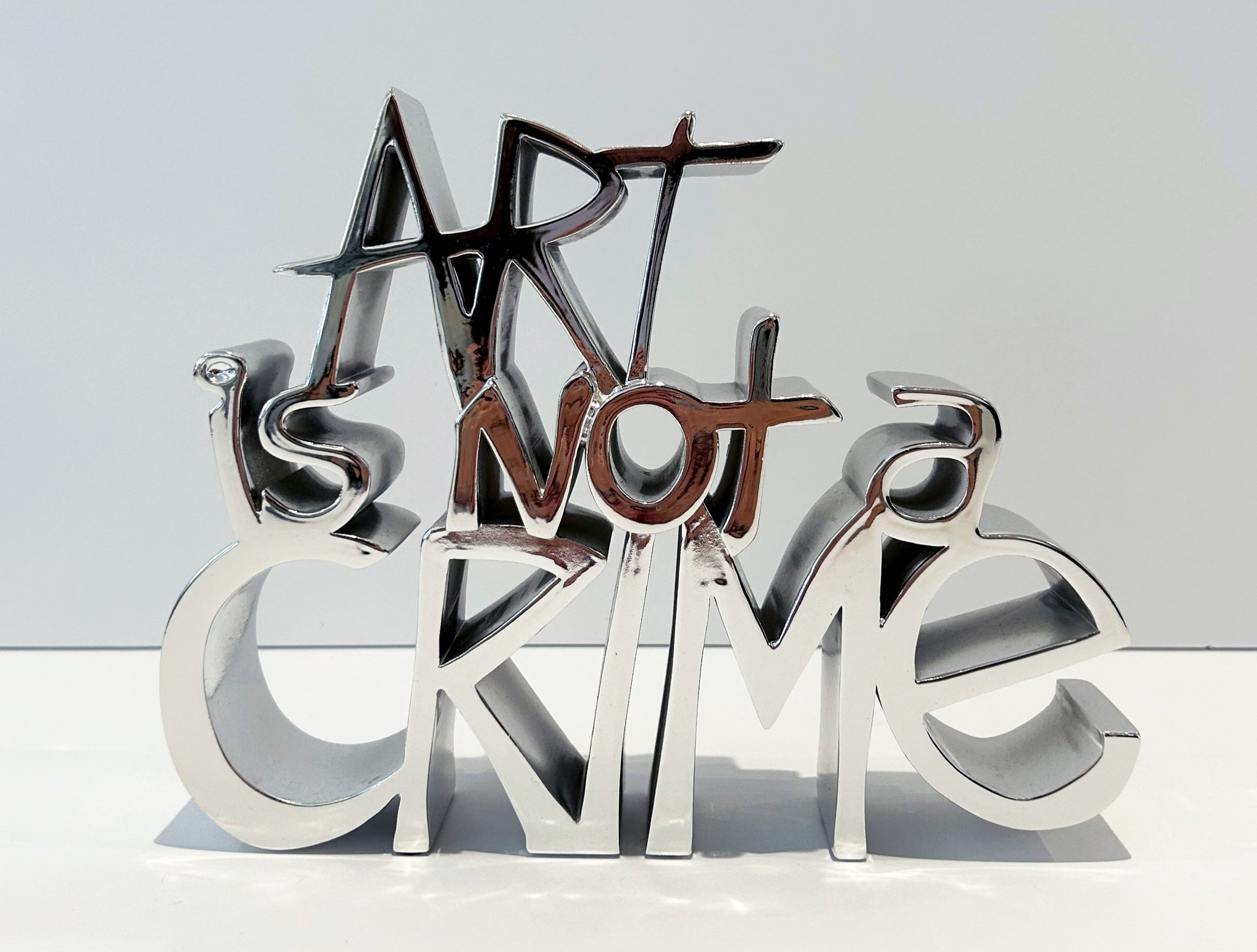 Mr. Brainwash Art is Not a Crime (Silver) 2021 – Georgetown Frame Shoppe